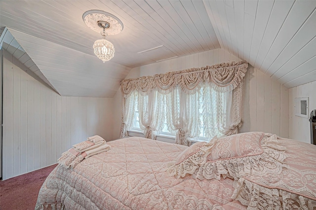 614 Clear Lake Rd, Kemah, TX 77565 - carpeted bedroom with lofted ceiling, wooden walls, a chandelier, and wood ceiling