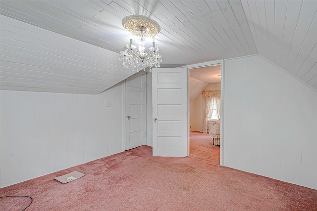 614 Clear Lake Rd, Kemah, TX 77565 - bonus room with light carpet, a chandelier, vaulted ceiling, wood walls, and wooden ceiling