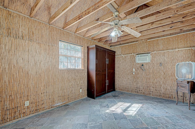 614 Clear Lake Rd, Kemah, TX 77565 - below grade area with stone tile flooring, ceiling fan, a wall mounted air conditioner, and wood walls