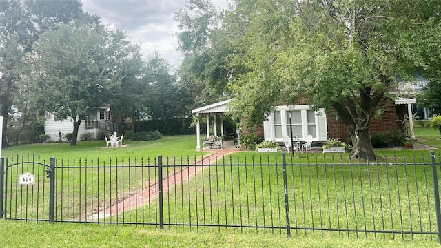 614 Clear Lake Rd, Kemah, TX 77565 - view of yard featuring covered porch