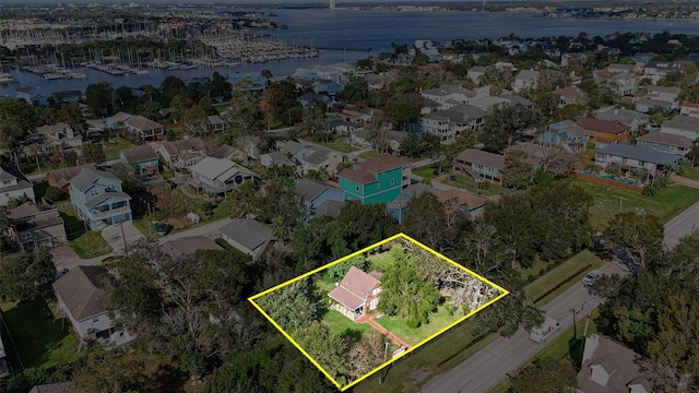 614 Clear Lake Rd, Kemah, TX 77565 - aerial perspective of suburban area with a nearby body of water and property boundaries highlighted