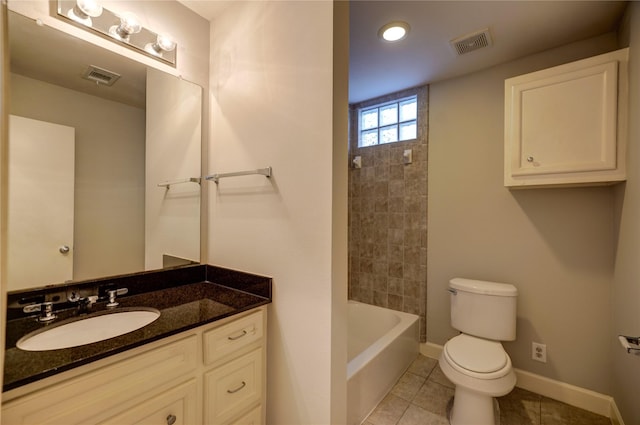 full bathroom featuring tile patterned floors, bathing tub / shower combination, vanity, and toilet