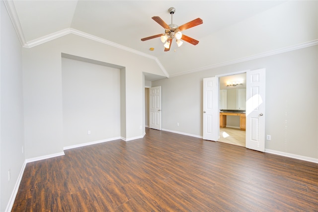 interior space featuring crown molding, ceiling fan, dark hardwood / wood-style floors, and vaulted ceiling