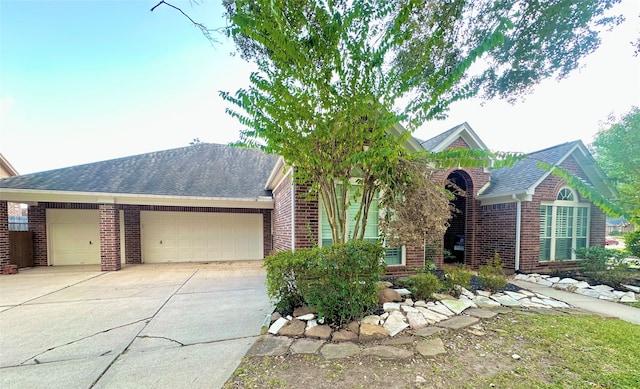 single story home featuring a garage