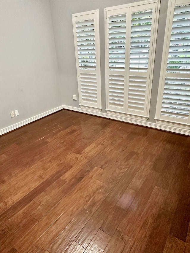 empty room featuring hardwood / wood-style floors