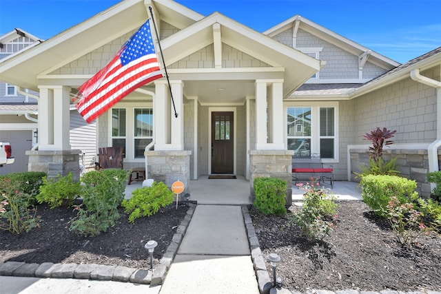 property entrance with a porch