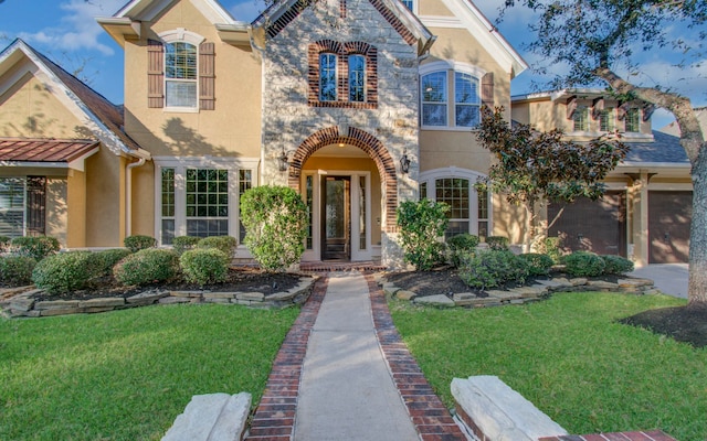 view of front facade with a front yard