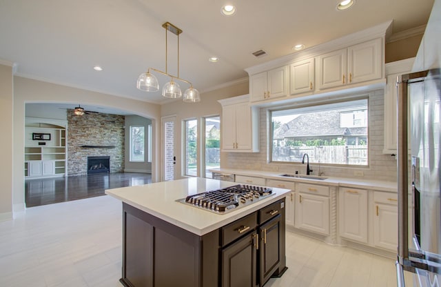 kitchen featuring white cabinets, sink, and appliances with stainless steel finishes