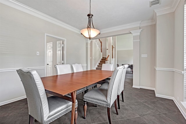 tiled dining area with crown molding