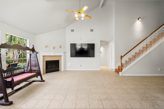 living room with light tile patterned floors, high vaulted ceiling, ceiling fan, and beam ceiling