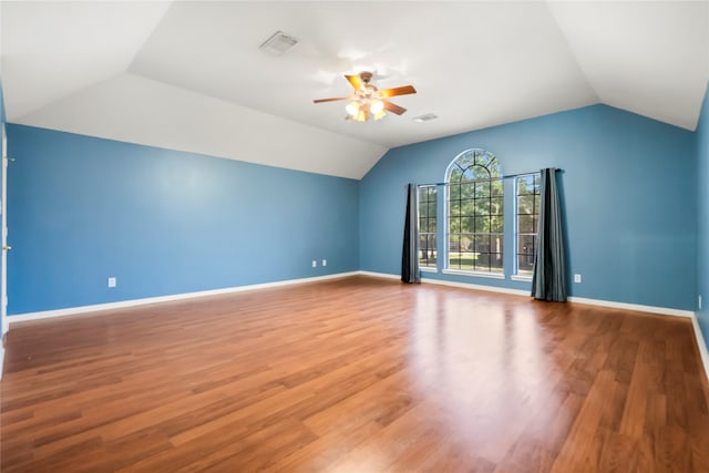 bonus room with ceiling fan, wood-type flooring, and lofted ceiling