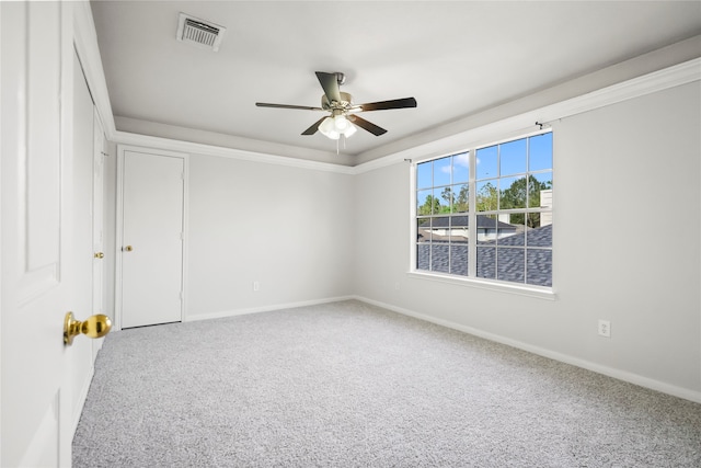 carpeted empty room with ceiling fan