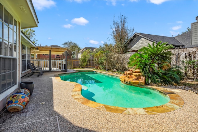 view of swimming pool with a patio area