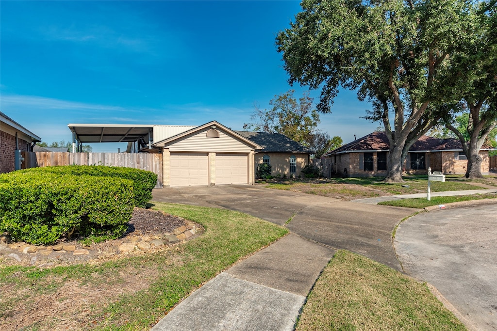 single story home with a garage