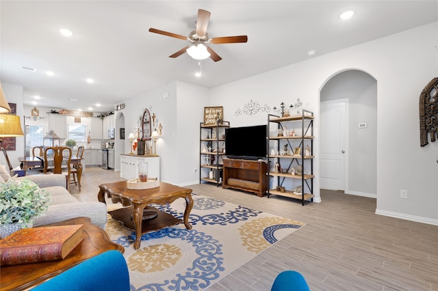 living room featuring ceiling fan