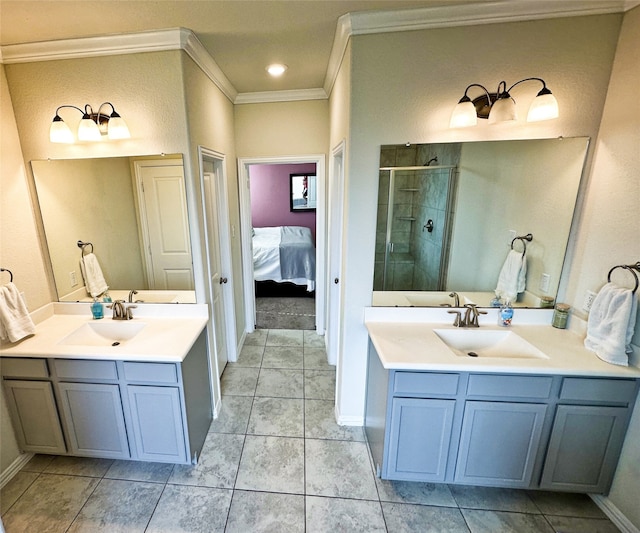 bathroom with crown molding, tile patterned flooring, vanity, and a shower with shower door