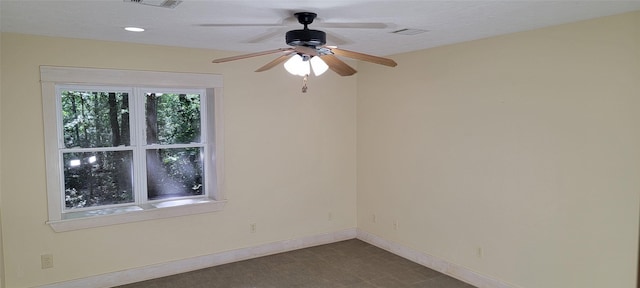 spare room featuring ceiling fan