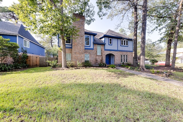 view of front of home featuring a front yard