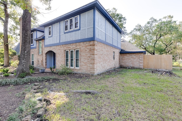 exterior space featuring a front lawn