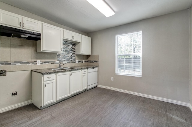 kitchen featuring dishwasher, white cabinets, wood-type flooring, and sink