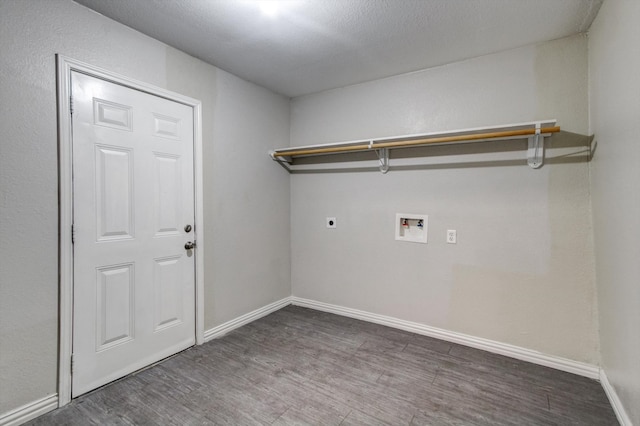 clothes washing area featuring washer hookup, electric dryer hookup, and dark hardwood / wood-style flooring