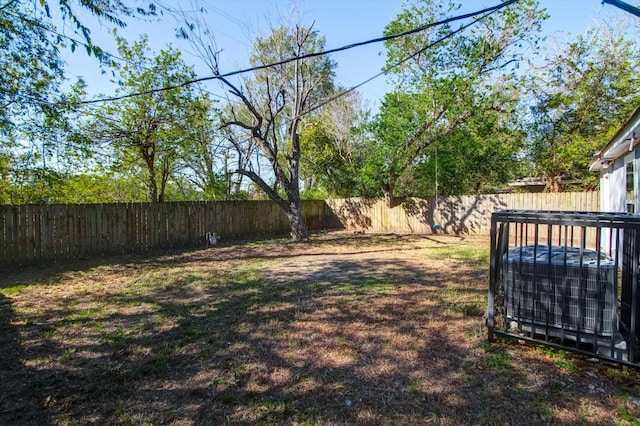 view of yard with central AC unit