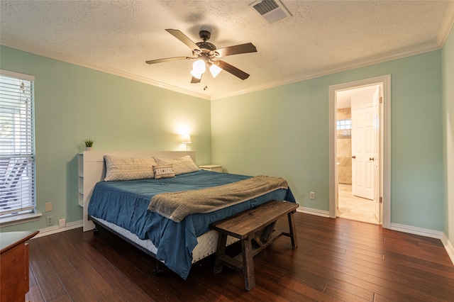 bedroom featuring dark hardwood / wood-style flooring, ensuite bathroom, ornamental molding, a textured ceiling, and ceiling fan