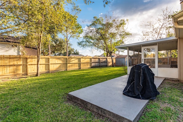 view of yard with a patio area and a sunroom