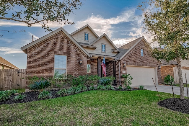 view of front of home featuring a front lawn and a garage