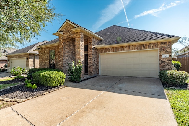 view of front of property featuring a garage