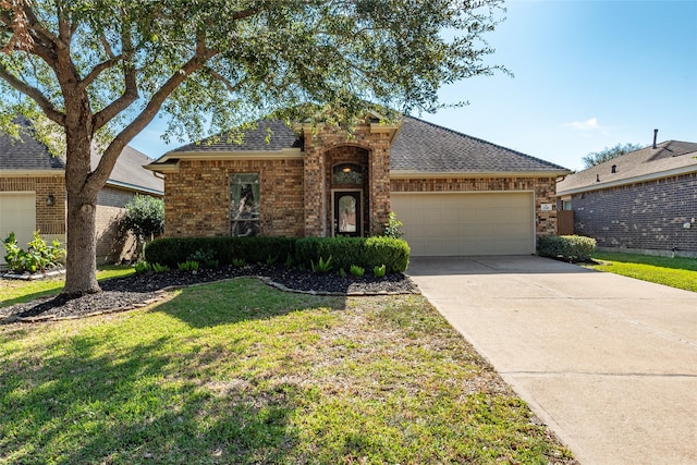 ranch-style house featuring a front lawn