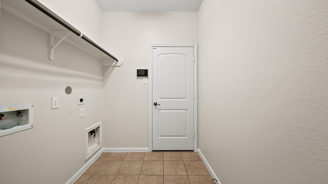 washroom with hookup for an electric dryer, gas dryer hookup, light tile patterned floors, and washer hookup