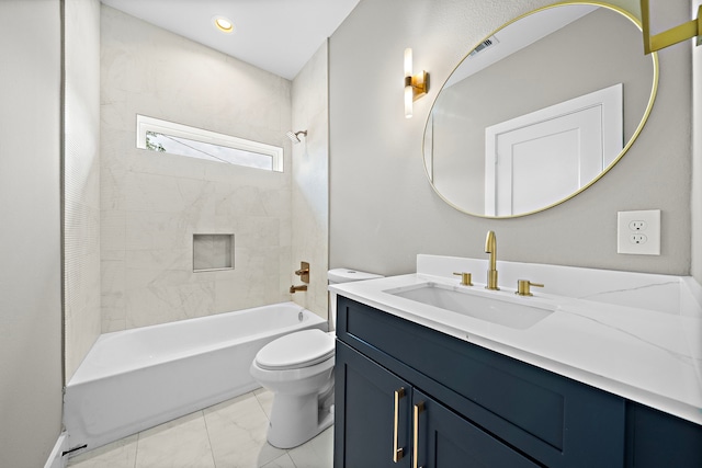 full bathroom featuring tiled shower / bath combo, toilet, and vanity