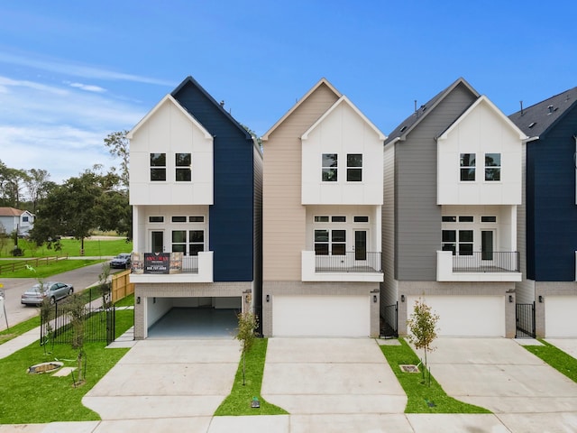 view of front of house with a front lawn and a garage