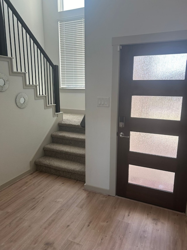 foyer with hardwood / wood-style floors