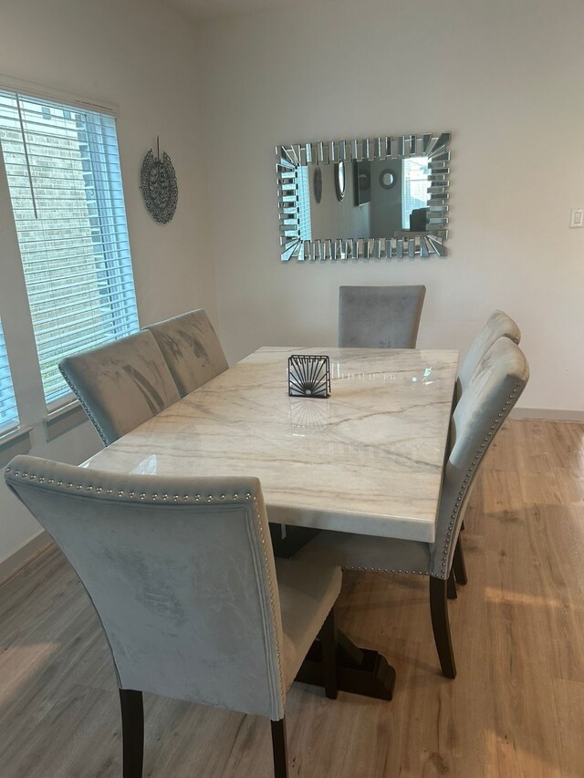 dining room featuring hardwood / wood-style floors