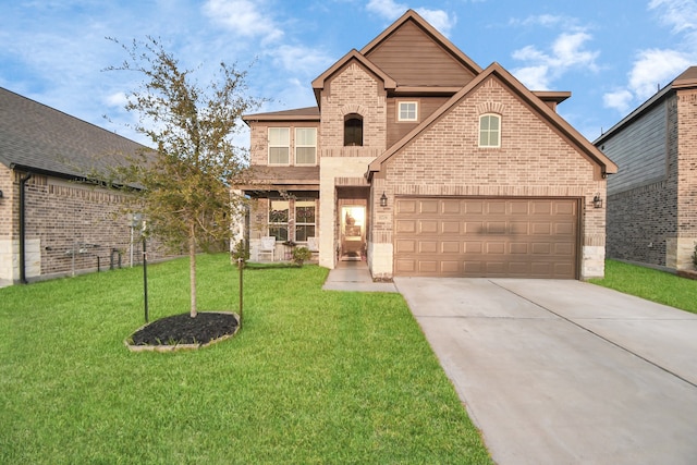 view of front property featuring a garage and a front lawn