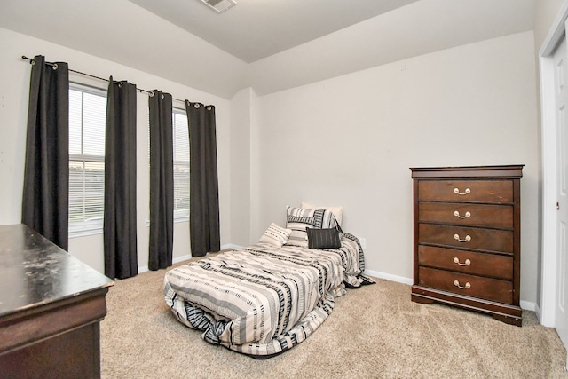 bedroom featuring light colored carpet