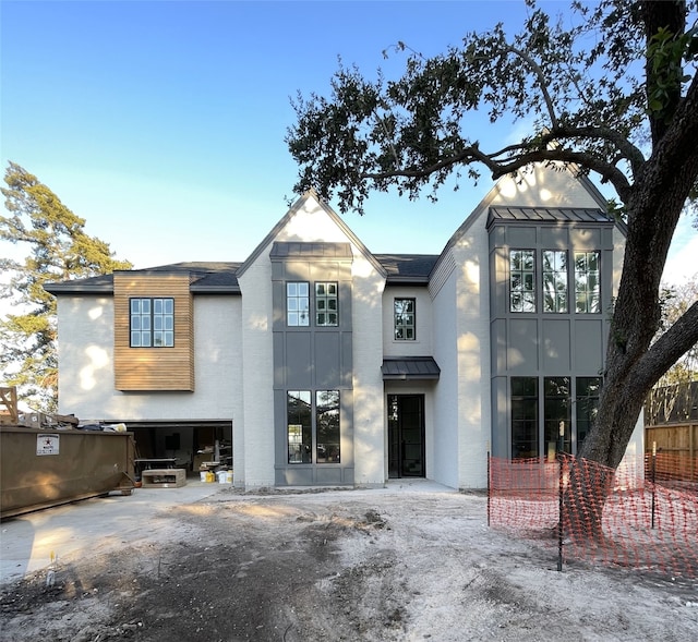 view of front of home with a garage