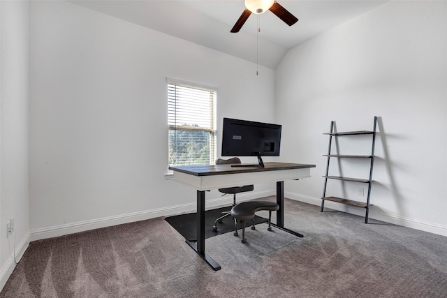 carpeted office space with ceiling fan and lofted ceiling