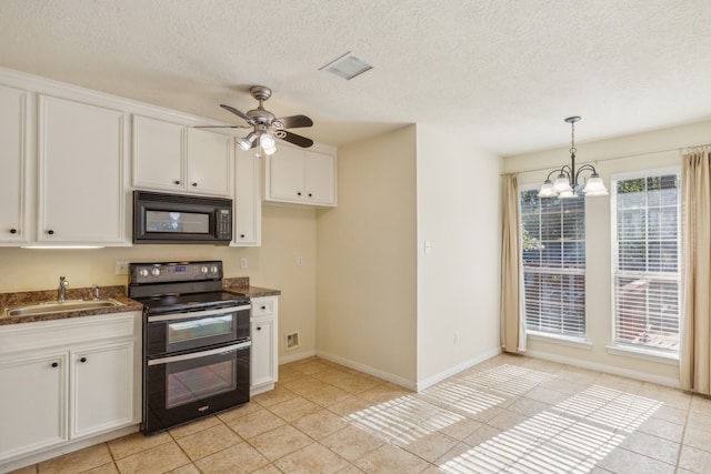 kitchen with sink, white cabinets, light tile patterned flooring, black appliances, and ceiling fan with notable chandelier