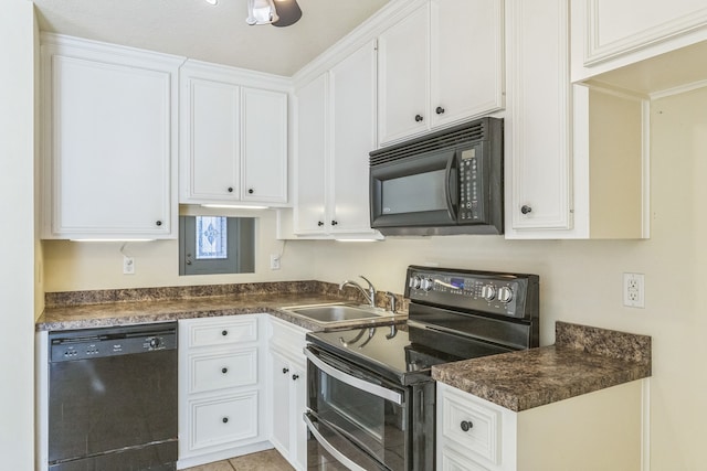 kitchen featuring white cabinets, sink, light tile patterned flooring, and black appliances