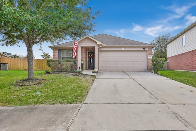 ranch-style home featuring a front lawn and a garage