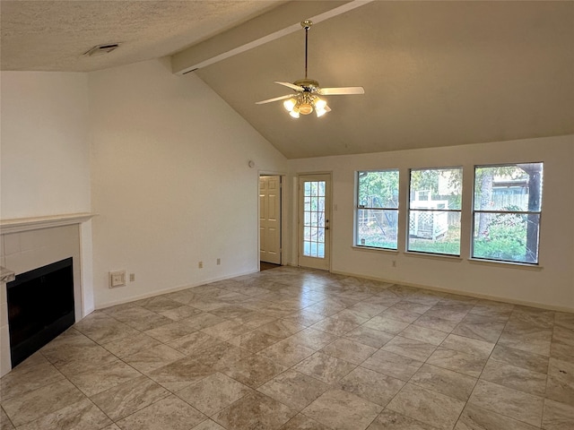 unfurnished living room with beam ceiling, ceiling fan, high vaulted ceiling, a textured ceiling, and a fireplace