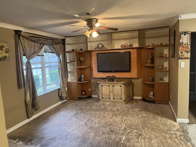 unfurnished living room featuring ceiling fan, a textured ceiling, and ornamental molding