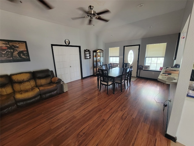 dining room featuring dark hardwood / wood-style floors and ceiling fan