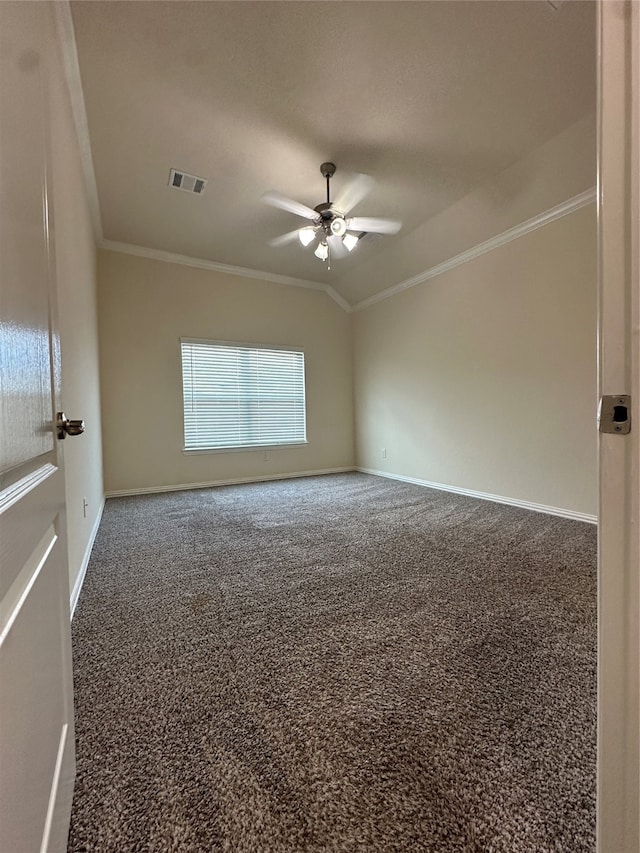 carpeted spare room with ceiling fan and ornamental molding