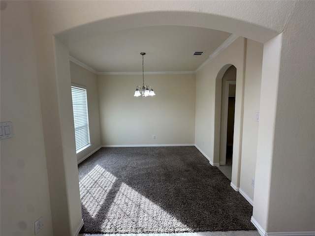 unfurnished dining area featuring a chandelier, carpet flooring, and crown molding