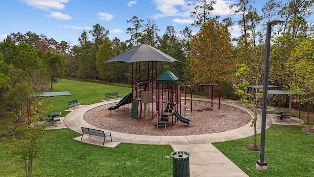 view of playground with a yard