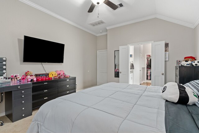 bedroom featuring ceiling fan, crown molding, light carpet, and vaulted ceiling